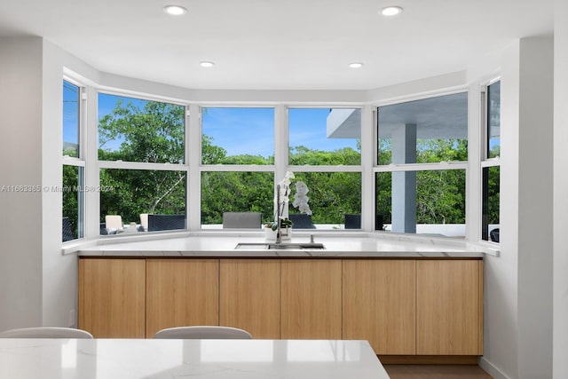 325 Campana Ave, Coral Gables, FL 33156 - kitchen featuring a sink, modern cabinets, light brown cabinetry, and recessed lighting