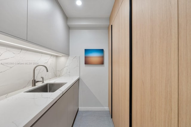 325 Campana Ave, Coral Gables, FL 33156 - bar with a sink, backsplash, baseboards, light tile patterned flooring, and recessed lighting