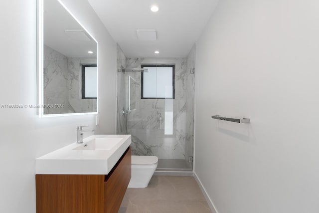 325 Campana Ave, Coral Gables, FL 33156 - full bathroom with toilet, a marble finish shower, recessed lighting, vanity, and baseboards