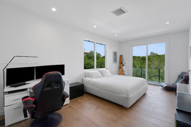 325 Campana Ave, Coral Gables, FL 33156 - bedroom with access to outside, an office area, wood finished floors, and recessed lighting