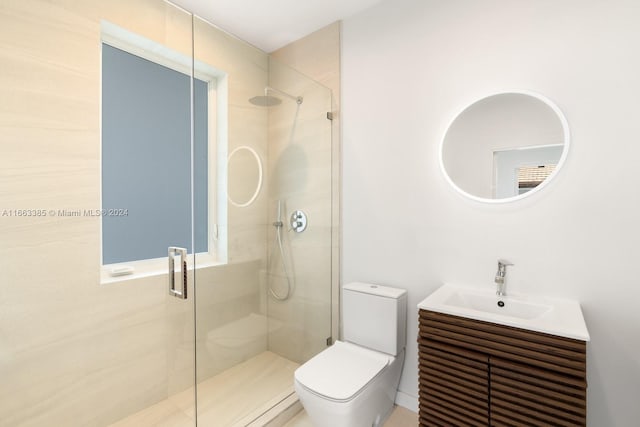 325 Campana Ave, Coral Gables, FL 33156 - full bathroom featuring a stall shower, toilet, and vanity