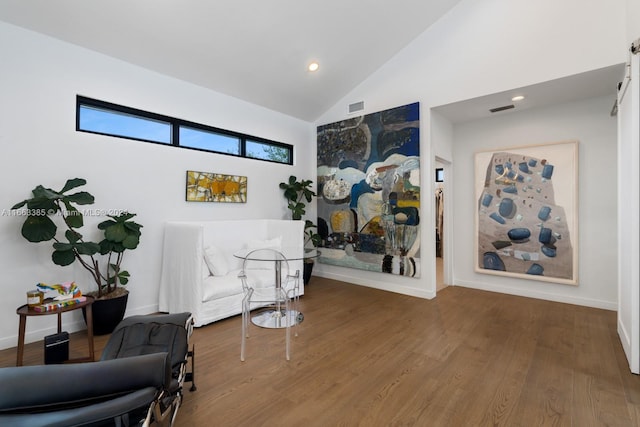 325 Campana Ave, Coral Gables, FL 33156 - sitting room featuring high vaulted ceiling, wood finished floors, recessed lighting, and baseboards