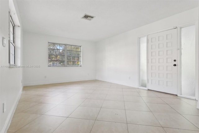 view of tiled spare room