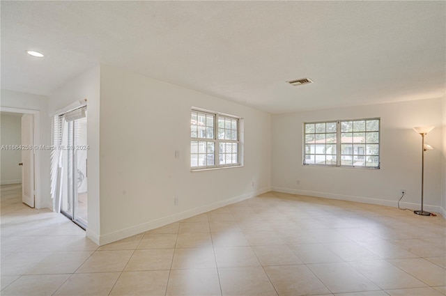 view of tiled empty room