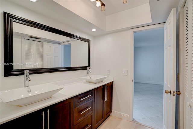 bathroom featuring vanity and tile patterned flooring