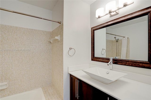 bathroom with vanity and curtained shower