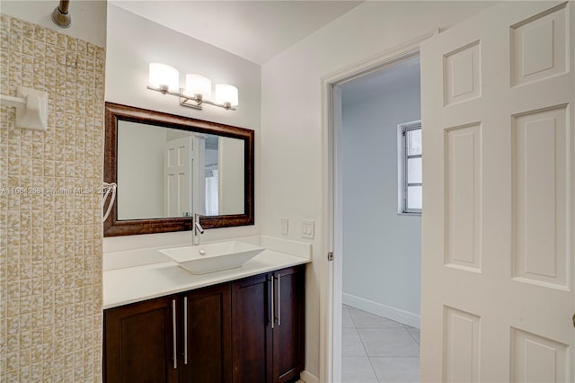 bathroom with vanity and tile patterned floors