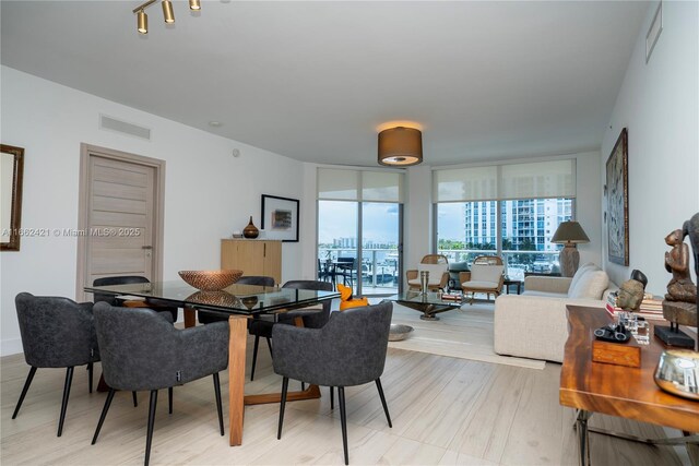 dining room featuring light wood-type flooring