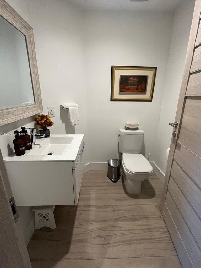 bathroom featuring plus walk in shower, tile patterned floors, and vanity