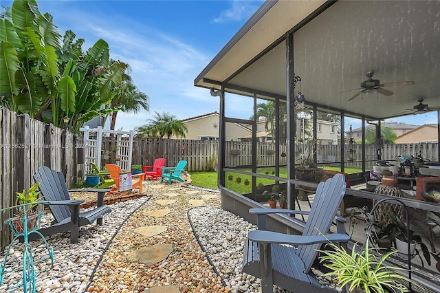 view of patio featuring ceiling fan