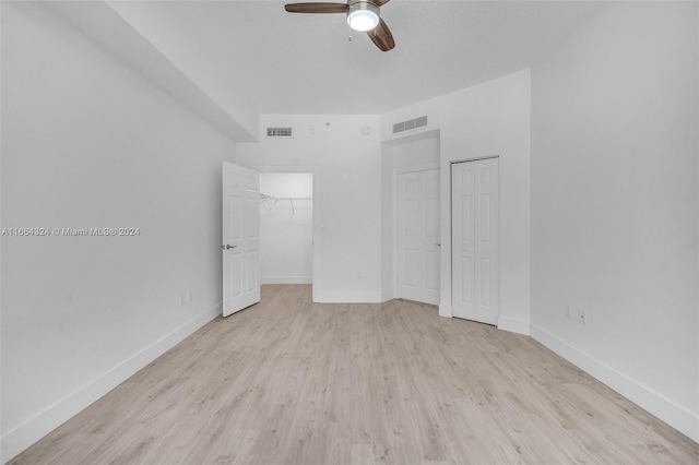 full bathroom with vanity, tiled shower / bath combo, toilet, and tile patterned floors