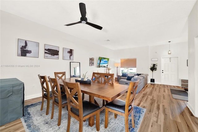 dining room with light wood-type flooring and ceiling fan