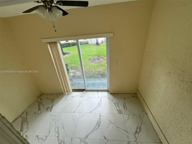 empty room featuring ceiling fan