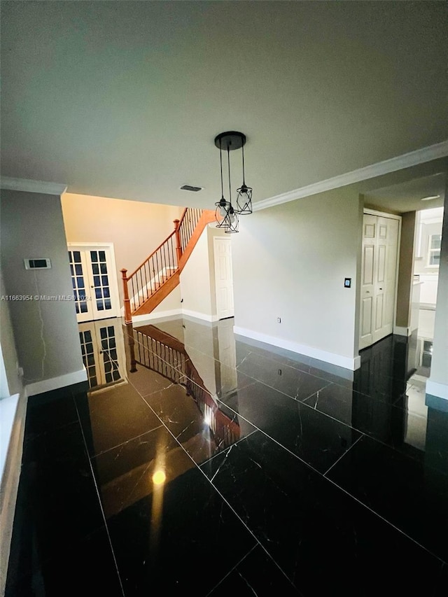 staircase with a notable chandelier and crown molding