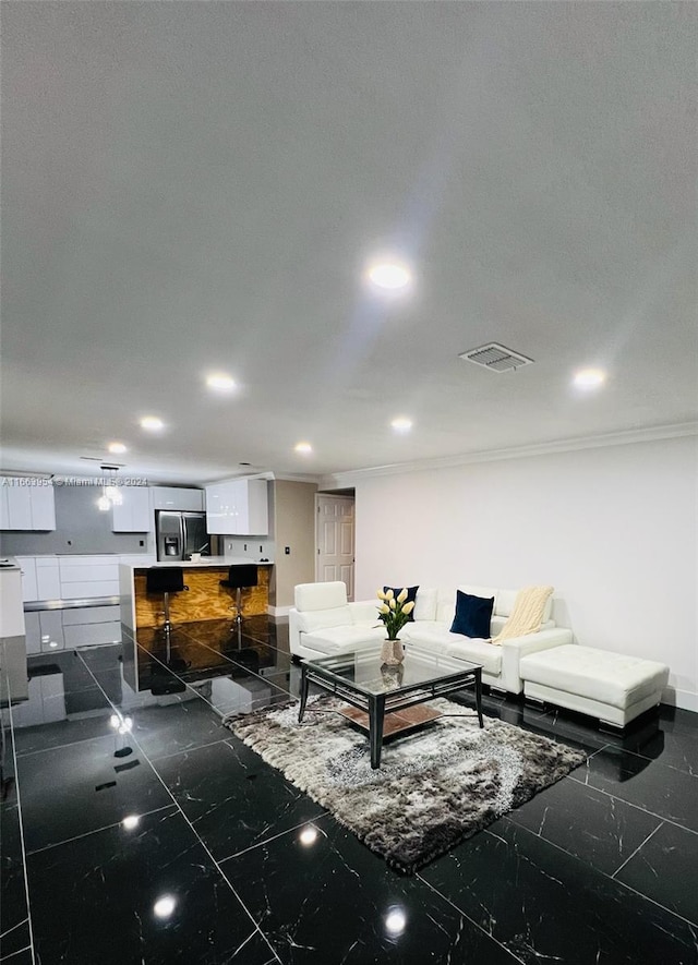 living room with crown molding