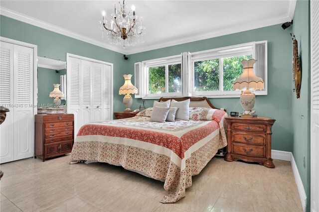 1407 San Marco Ave, Coral Gables, FL 33134 - tiled bedroom with a notable chandelier, baseboards, multiple closets, and ornamental molding