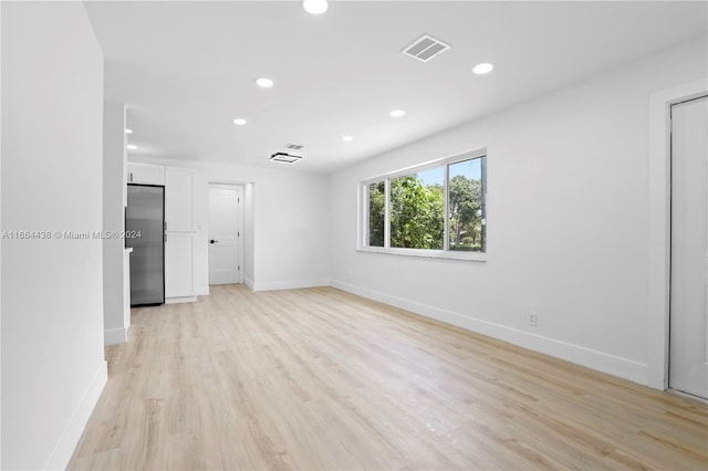 empty room featuring light wood-type flooring