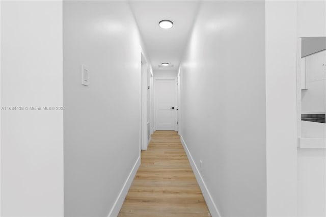 hall featuring light hardwood / wood-style flooring