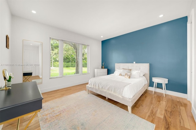 bedroom featuring light hardwood / wood-style floors