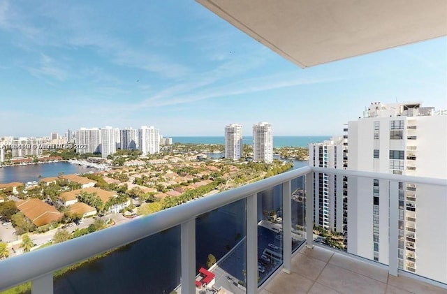 balcony featuring a water view