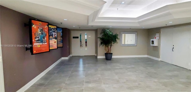 interior space featuring a tray ceiling