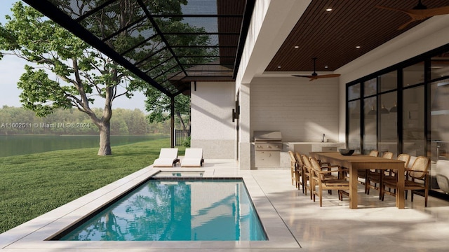 view of swimming pool with ceiling fan, a patio, grilling area, a lawn, and a water view