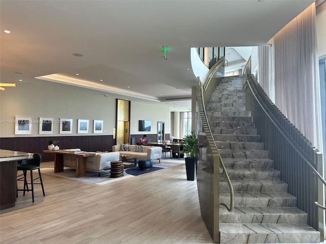 stairway featuring hardwood / wood-style floors