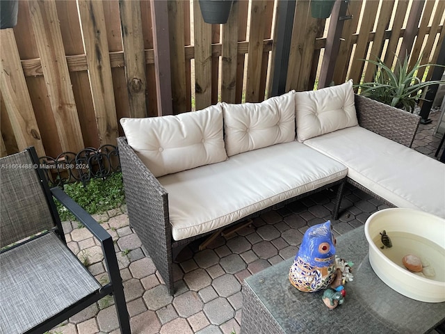 balcony featuring outdoor lounge area and a patio