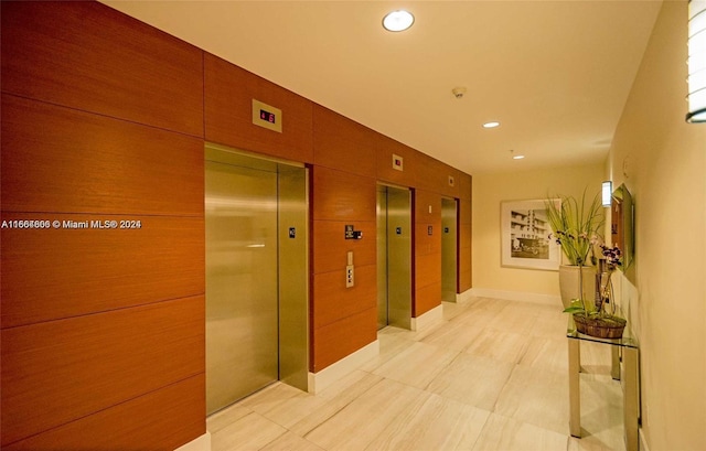 hall featuring elevator