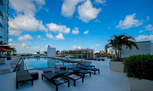 1861 NW S River Dr Unit 1404, Miami, FL 33125 - community pool with a gazebo and a patio area