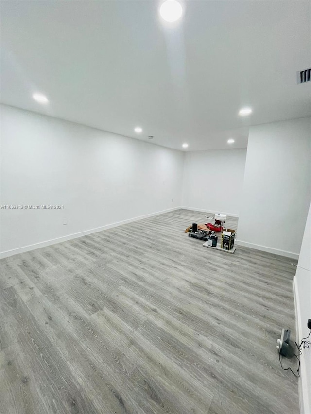 exercise area featuring light wood-type flooring