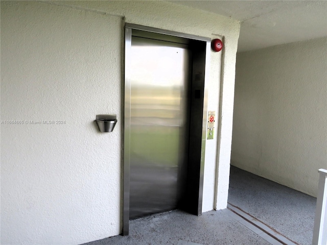 view of exterior entry with elevator