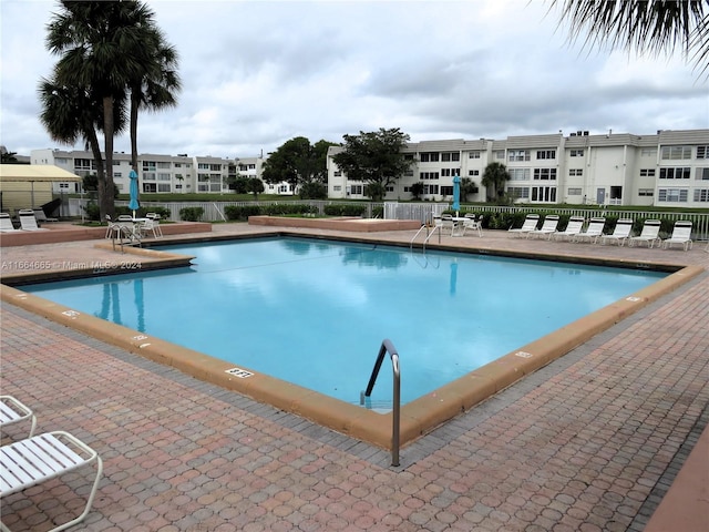 view of pool with a patio area