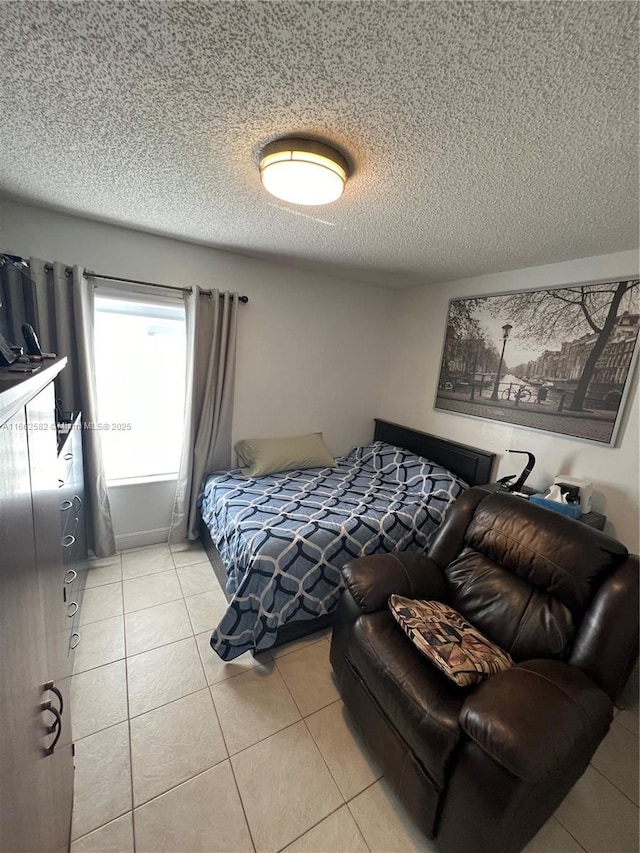 bedroom featuring light tile patterned floors