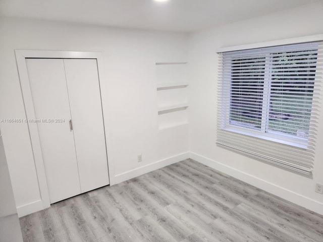 unfurnished bedroom featuring light hardwood / wood-style floors