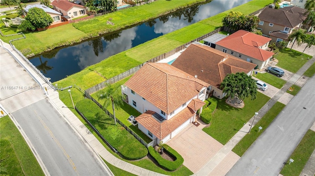 drone / aerial view with a water view