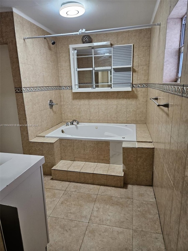 bathroom featuring vanity, tile walls, and tile patterned floors