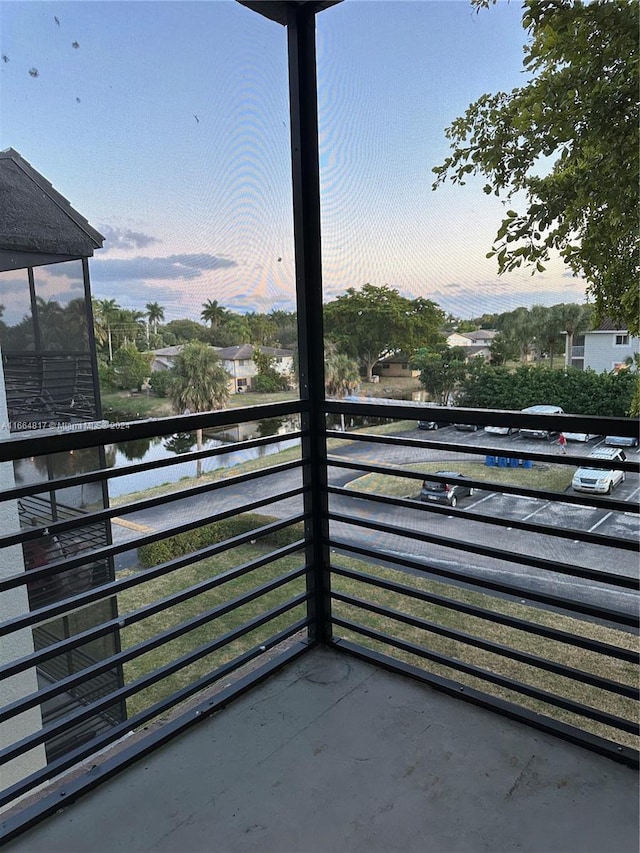 view of balcony at dusk