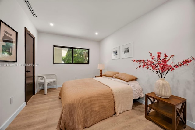 bedroom featuring light wood-type flooring