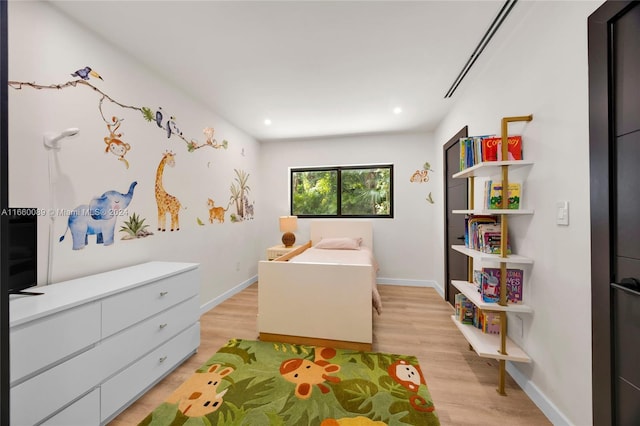 bedroom featuring light wood-type flooring