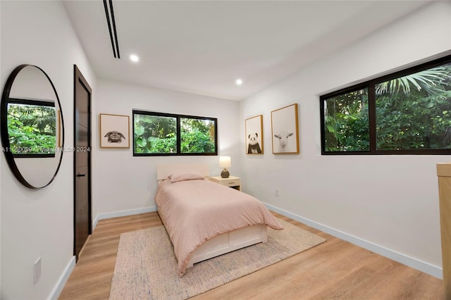 bedroom featuring light hardwood / wood-style flooring