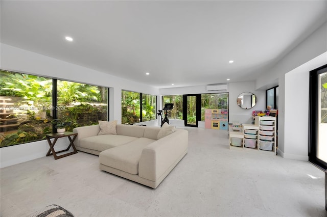 living room with a wall mounted air conditioner