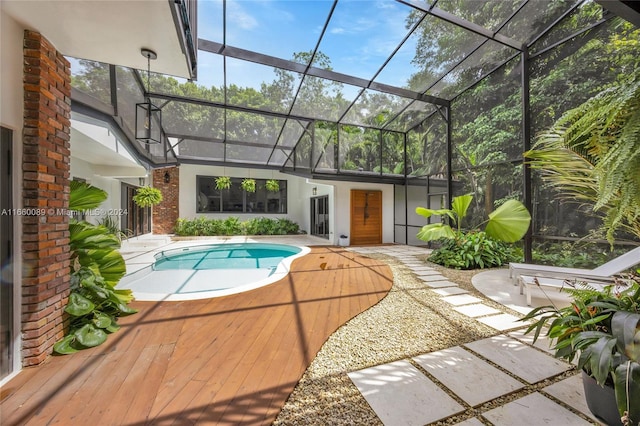 view of pool with a lanai and a patio area