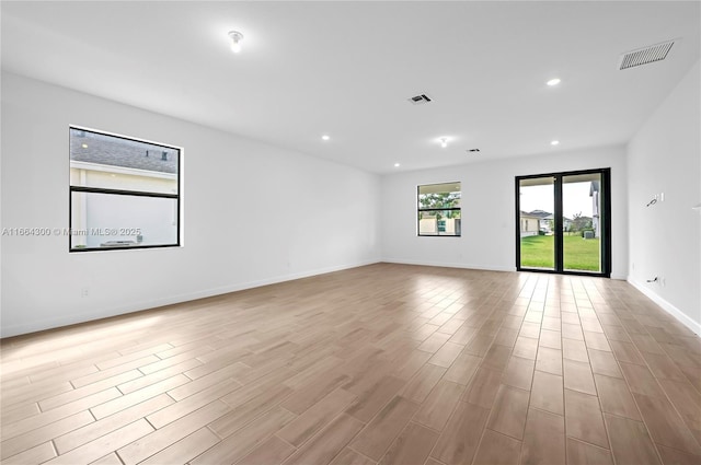 empty room featuring light hardwood / wood-style floors