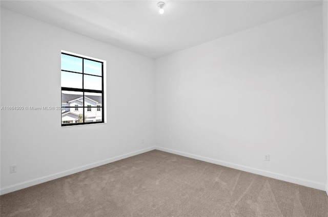 empty room with carpet floors