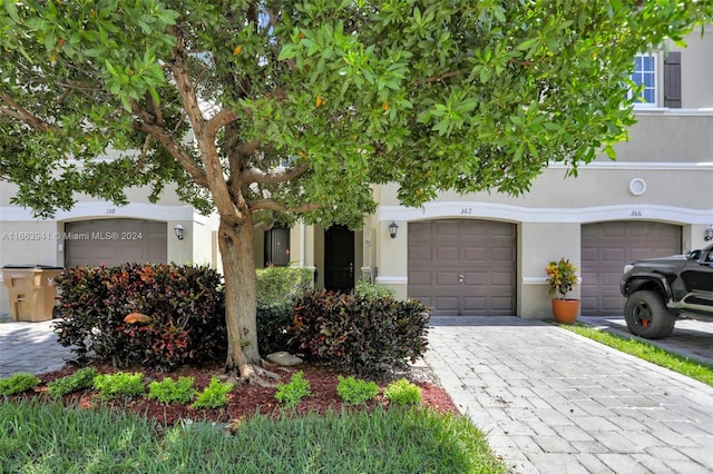 view of front of home with a garage