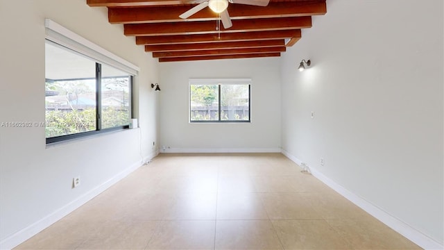 tiled empty room with vaulted ceiling with beams and ceiling fan