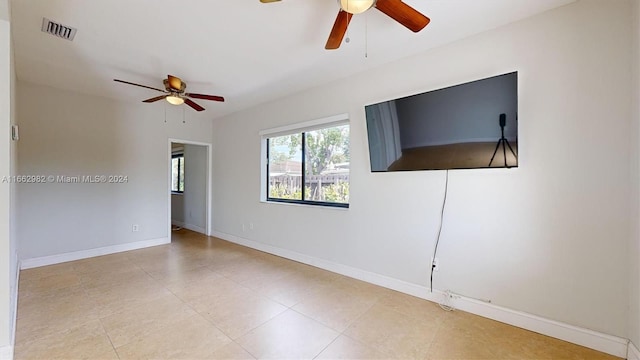 unfurnished room featuring ceiling fan