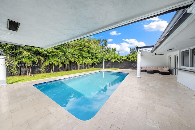 view of swimming pool featuring a patio area