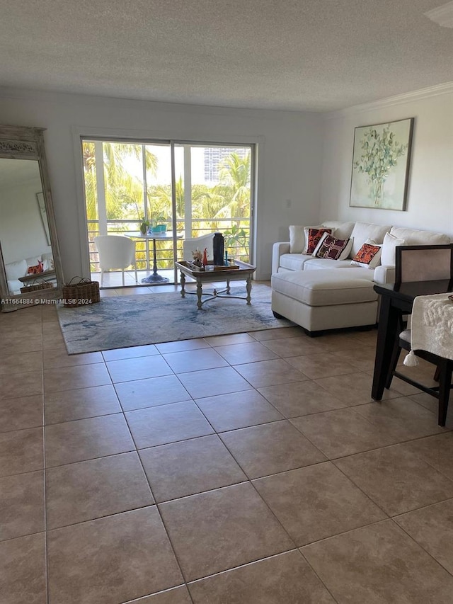 living room featuring a textured ceiling and tile patterned floors